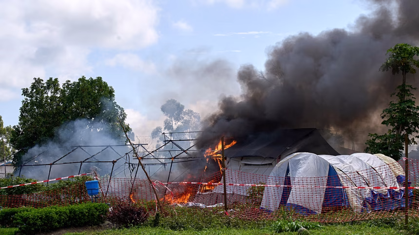Enraged crowd sets Ebola hospital tent on fire in Democratic Republic of Congo