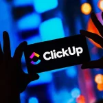 ClickUp logo on a smartphone