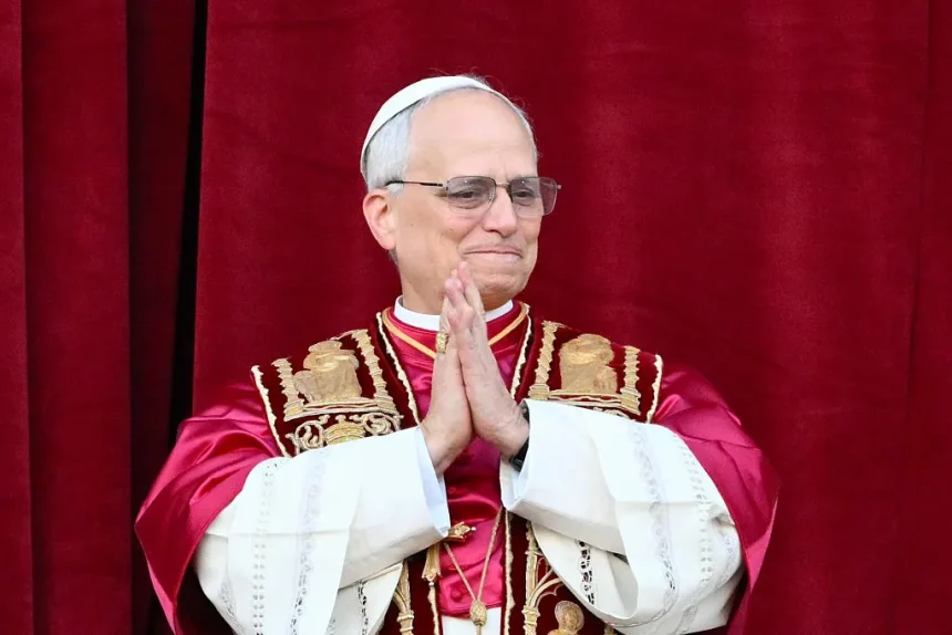 Pope Leo XIV, Robert Prevost arrives on the main central loggia balcony of the St Peter