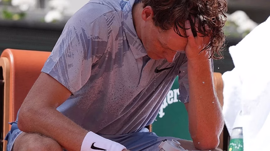 Top-ranked player Jannik Sinner withdraws from Roland Garros midway through battling the heat