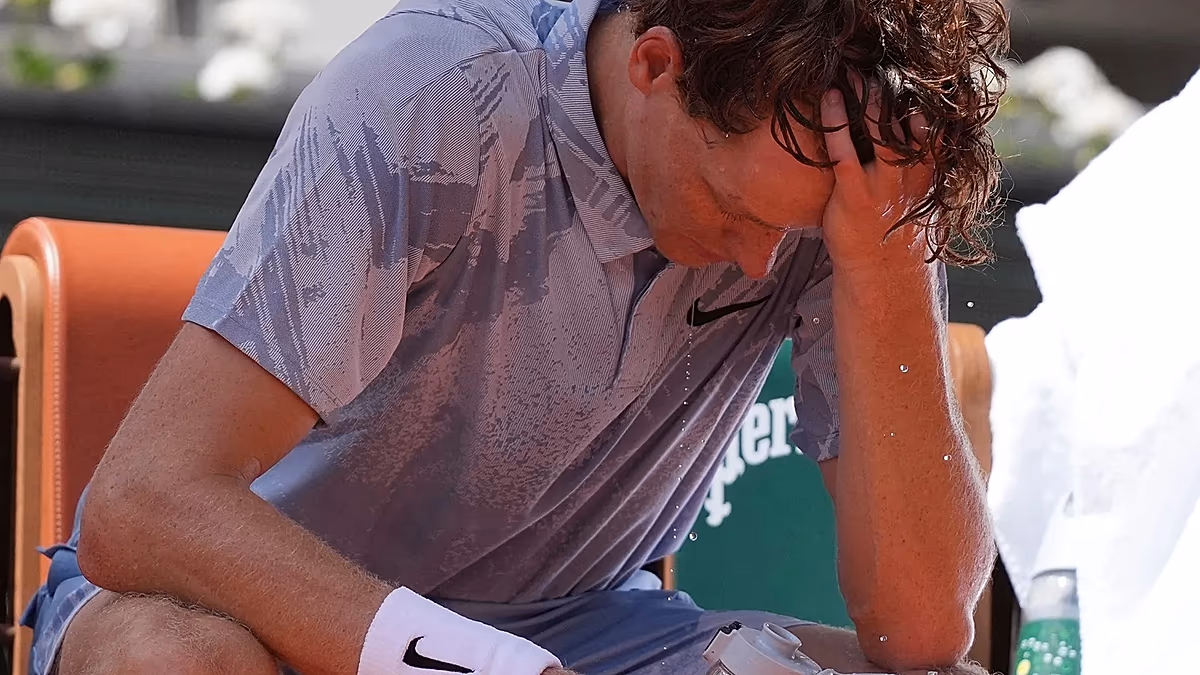 Top-ranked player Jannik Sinner withdraws from Roland Garros midway through battling the heat