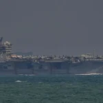 President Trump claims 'massive' US armada is on the way as tensions with Iran escalate