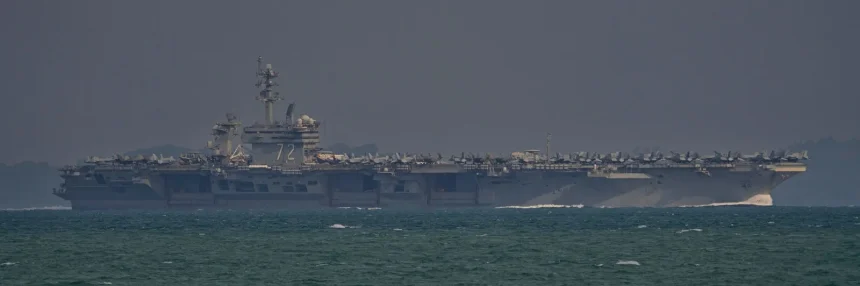 President Trump claims 'massive' US armada is on the way as tensions with Iran escalate