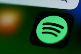 Spotify icon displayed on a phone screen