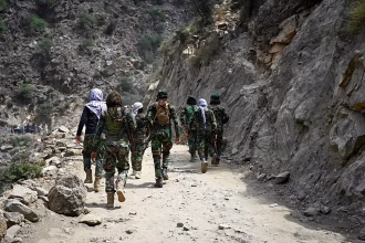 EU migration commissioner says there is no choice but to talk to Taliban about returning migrants