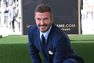 David Beckham's 'climbing a mountain' with Brooklyn isn't about weddings, press or Nicolas