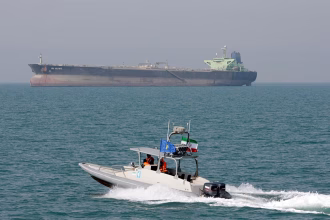 Revolutionary Guards warn ships off Hormuz Oman corridor as Rubio draws line on tolls