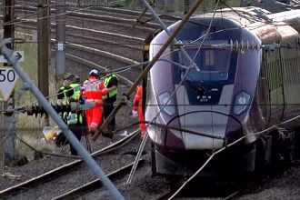 Two trains collide in UK, driver dead, nine in critical condition