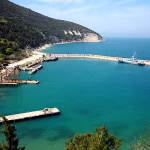 What is "Kushner Island" and why are Albanians protesting about it?