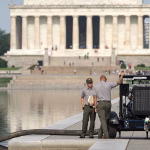 Crews re-drain the Lincoln Memorial's reflecting pool as part of Trump's troubled president's revamp
