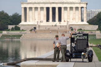 Crews re-drain the Lincoln Memorial's reflecting pool as part of Trump's troubled president's revamp