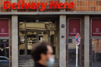 German delivery hero backs €13 billion takeover by Uber