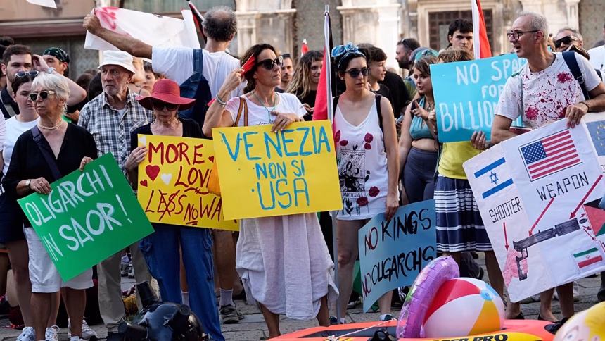 'Let's read America again': Venice protesters greet US ambassador with protest placards