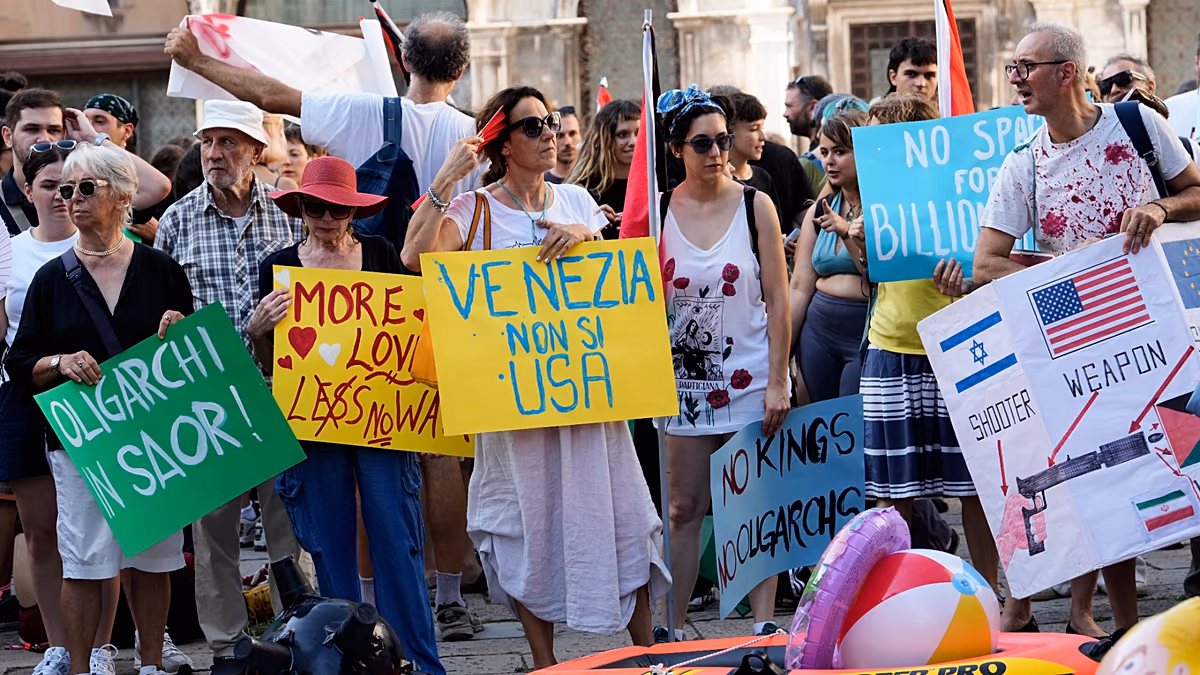 'Let's read America again': Venice protesters greet US ambassador with protest placards