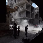 The Damascus explosion was caused by a bomb, and the death toll rose to five, state television reported.