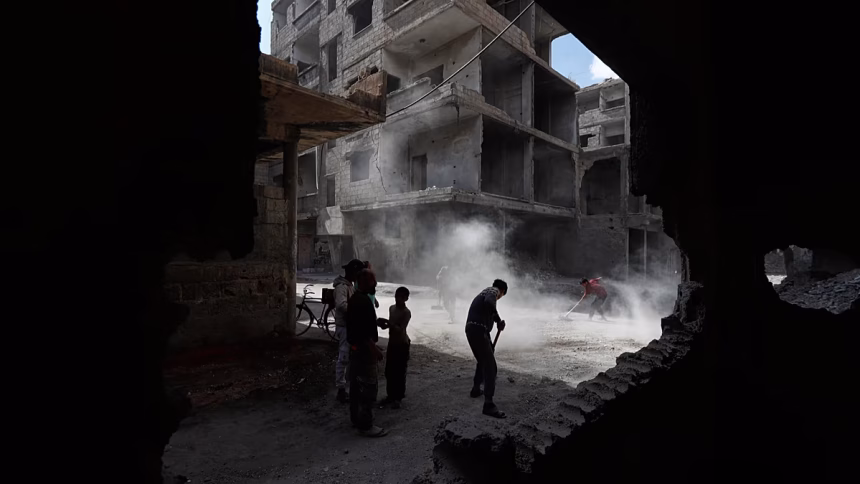 The Damascus explosion was caused by a bomb, and the death toll rose to five, state television reported.
