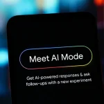 In this photo illustration, the Google Meet AI Mode logo is seen displayed on a smartphone screen.